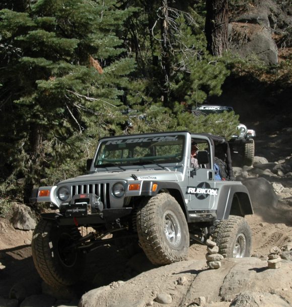 Rubicon Express promotional Jeep on the rocks