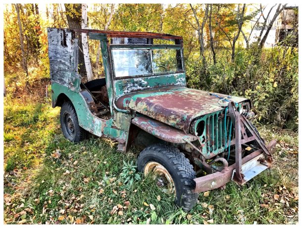 An old Willys MB, wasting away in a field